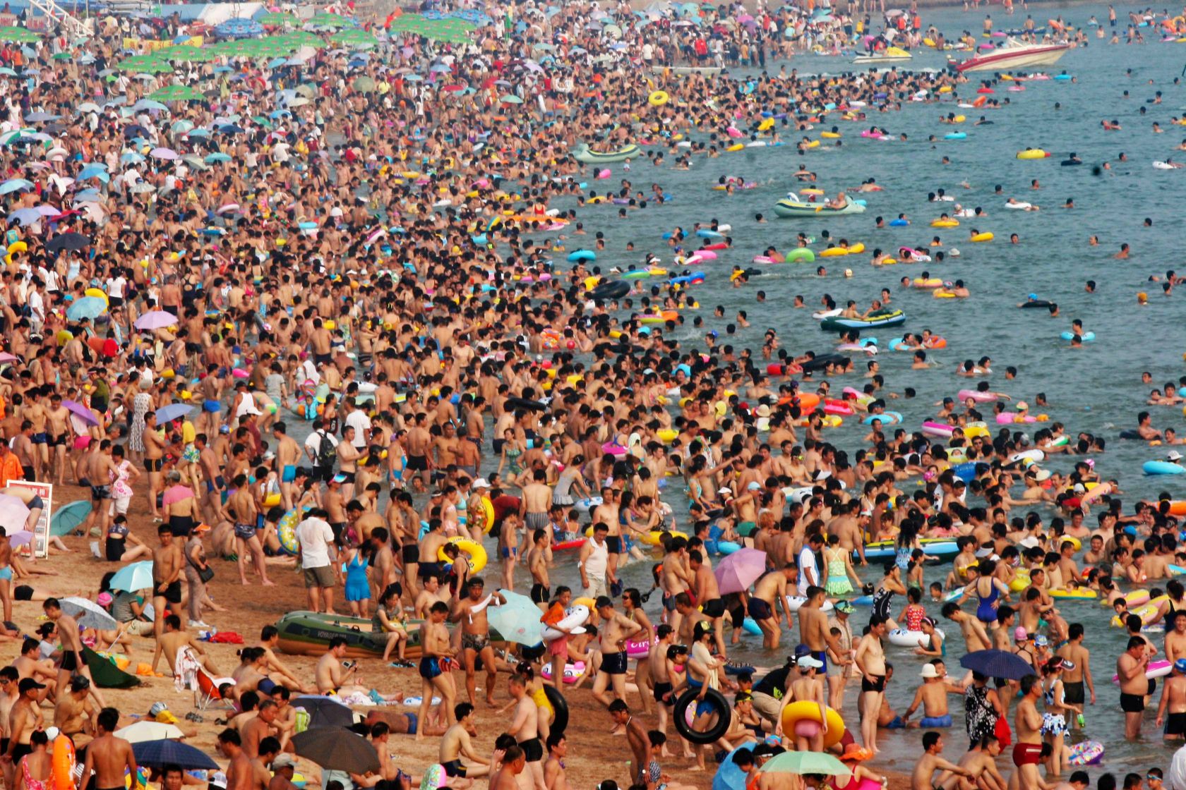 Beach crowded with tourists